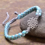 Bracciale con Cristallo Azzurro e simbolo Chakra – Gioielli per l’Anima